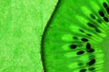 Free Slice Of Kiwi Fruit On Rough Green Royalty Free Stock Photography - 3981627