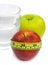 Free Glass With Water, Green And Red Apple Stock Image - 4094341