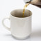 Free Pouring Coffe Into Cup Royalty Free Stock Image - 4222436