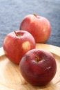 Free Red Apples On Wooden Plate With Blue Royalty Free Stock Image - 4276136