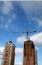 Free Crane And Two Buildings Stock Image - 4444461