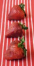 Free Strawberrys On A Red Striped Tablecloth Royalty Free Stock Photo - 4554895