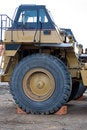 Free Dump Truck With Large Tire Royalty Free Stock Image - 4613086