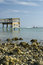 Free Pier Rocky Shoreline With Boat Stock Images - 4680554