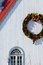 Free A Christmas Wreath Haning On A Building Royalty Free Stock Photos - 4752298