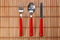 Free Spoon, Fork And Knife On Bamboo Background Royalty Free Stock Photos - 4771288