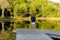 Free Man Fishing Very Early In The Morning Off A Pier O Royalty Free Stock Photography - 4803437