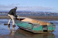 Free Spring Storms Beach A Fishing Boat. Royalty Free Stock Images - 4882829
