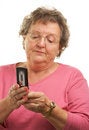 Free Senior Woman Texting On Cell Phone Stock Photos - 4894063