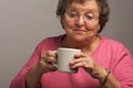 Free Senior Woman Enjoys Some Coffee Stock Photography - 4894192