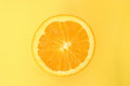 Free Half An Orange Over Yellow Stock Photos - 497783