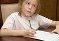 Free Thoughtful Girl Doing Homework Royalty Free Stock Photography - 4902227