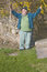 Free The Leprechaun Raises Both Arms Royalty Free Stock Image - 4990046