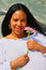Free Woman Holding A Pink Flower Stock Images - 5067694