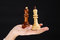 Free Two Chesspieces On The Palm Stock Images - 5092434