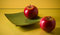 Free Flat Ceramic Plate And Two Apples On Yellow Stock Photos - 5153473