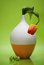 Free Ceramic Vase With A Tulip And Apples On Green Stock Photo - 5216970