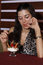Free Beautiful Girl Eating A Strawberry And Cream Stock Photo - 5231880