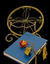 Free Dried-out Rose On Book  And Bookstand Royalty Free Stock Image - 5268236