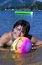 Free Teenager With Variegated Ball On The Beach Royalty Free Stock Image - 5312436