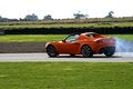 Free Orange Sportscar On The Track Stock Photos - 5336103