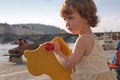 Free Playful Girl Rocking Stock Photography - 5391302