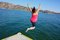 Free Girl Jumping Into A Lake Stock Image - 5424191
