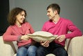 Free Couple Sit On Sofa With Pillow Stock Photography - 5466812