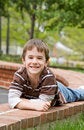 Free Little Boy Laying Down Smiling Stock Photo - 5475080