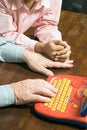 Free Grandfather And Grandson Sitting At The Table - Ve Royalty Free Stock Photography - 5480057
