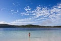 Free Young Girl Standing In The Tranquil Lake Stock Photo - 5528190