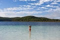 Free Young Girl Standing In The Tranquil Lake Stock Photos - 5528203