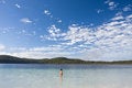 Free Young Girl Standing In The Tranquil Lake Royalty Free Stock Images - 5528249