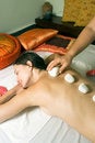 Free Girl Getting Rocks Placed On Back - Vertical Royalty Free Stock Photos - 5555468