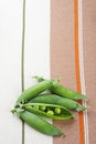 Free Fresh Green Peas On Tablecloth Background Royalty Free Stock Photography - 5606067