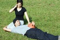Free Man And Woman Sitting On Grass - Horizontal Royalty Free Stock Photos - 5625358