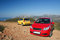 Free Two Small Family Cars Royalty Free Stock Image - 5674926