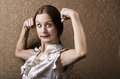 Free Young Woman Flexing Her Biceps Stock Image - 5717831
