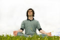 Free Man Sitting In The Lotus Posture Royalty Free Stock Photo - 5739315
