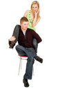 Free Joyful Couple Sitting On A Chair Stock Image - 5779001