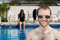 Free Man And Woman Sitting In Pool - Horizontal Royalty Free Stock Photo - 5771015