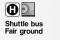 Free Sign Shuttle Bus To Fairground Royalty Free Stock Image - 585286
