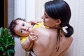 Free The Little Boy On A Shoulder At Mum, Looks In Lens Royalty Free Stock Images - 5826809