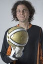 Free Soccer Player Holds Ball - Vertical Stock Image - 5829881
