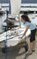 Free Woman Fixing Sail On Sailboat - Vertical Stock Photography - 5842682