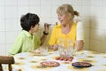 Free Boy Feeding Woman - Horizontal Stock Photography - 5850672
