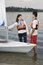 Free Couple Standing Next To Sailboat - Vertical Stock Images - 5899554