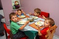 Free Young Boys Indoors Eating Stock Images - 5934534