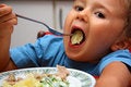 Free Young Boy Indoors Eating Royalty Free Stock Photos - 5934548