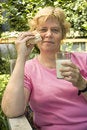 Free Elderly Woman Is Having Lunch Stock Image - 5945111